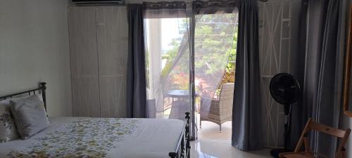 Oracabessa Apartment | By The Bay Oracabessa Queen Bedroom Suite