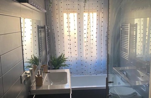 Quartiere XXXIV Lido di Ostia Levante Apartment | C&E Suites Roma
