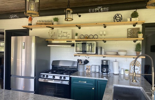Wellston Cabin | Camp HighBridge 2 Bed 1 Bath Big Manistee River, Private Frontage. Bunk House!