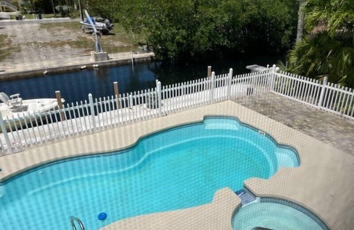 Doctor's Arm House | Canal Front Home With Pool And Hot Tub
