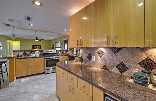 Skylark Estates Cottage | Canal-front Merritt Island Home w/Deck + Grill!