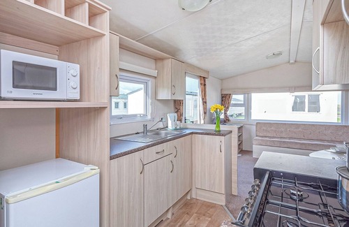 Prestatyn House | Caravan with one double and two twin.
