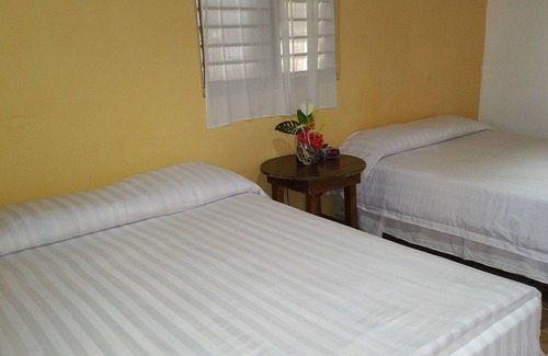 El Triunfo de La Cruz Bed & Breakfast | Caribbean Coral Inn Tela