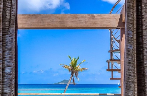 Spanish Town Villa | Caribbean Wind, 6 bedroom luxury beachside villa Mahoe Bay.