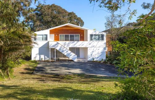 Culburra Beach House | Carramar - Fireplace - Absolute Waterfront