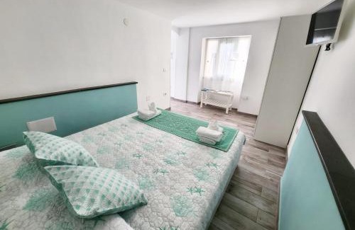 Cala Gonone Apartment | Casa al mare Orchidea - Motoparking - Wifi Free - AC
