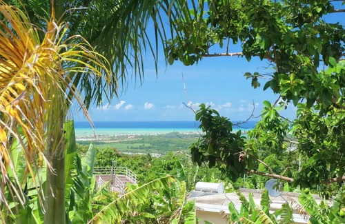 Zarzal House | Casa Bella - El Yunque Rainforest Mansion with Panoramic Views + Rooftop Lounge