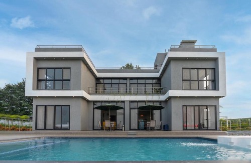 Mahiravani Villa | Casa Boho by StayVista - Contemporary design, Farm-view, Swimming pool & Indoor games for a chic retreat