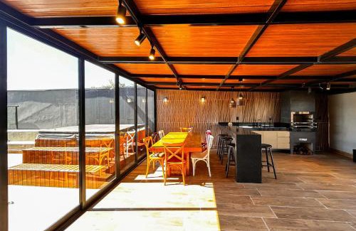 Recanto Araucaria House | Casa com 4 Suites, Jacuzzi e Lareira Externa