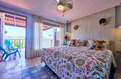 Portobelo Bed & Breakfast | Casa Congo & Casa Rayo Verde - Restaurante - Galeria de arte