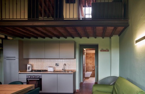 Asciano Apartment | Casa Crete Senesi Appartamento RIBES nel Podere di Sant’Antonio