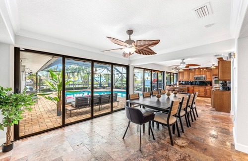 Cocoa Isles House | Casa De Olas Waterfront Luxe Home Heated Pool Boat Lift Minutes to Beach