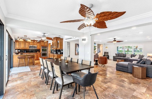 Cocoa Isles House | Casa De Olas Waterfront Luxe Home Heated Pool Boat Lift Minutes to Beach