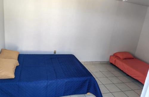 Uruapan House | Casa de tres habitaciones por infonavit constituyentes