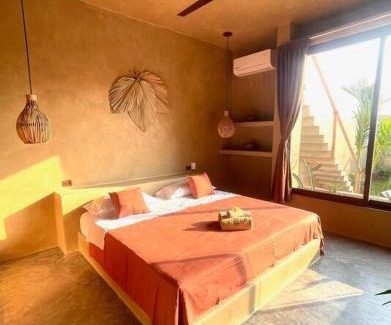 Brisas de Zicatela Villa | Casa Maloya alberca y vista al mar