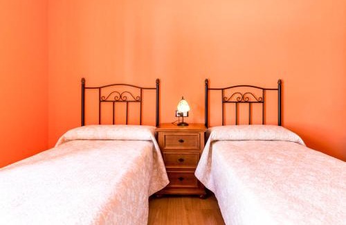 Niguelas Villa | Casa rosa del romeral