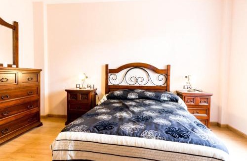 Niguelas Villa | Casa rosa del romeral