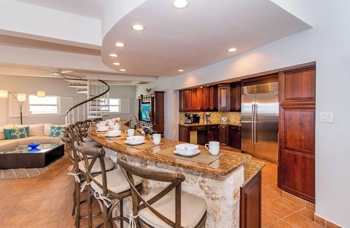 Gun Bay House | Cayman Castle: Luxury Gated Estate w/Elevated Views, Infinity Pool + Large Private Beach