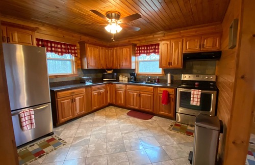 El Dorado Springs Cabin | Cedar Lodge is quaint rustic lodge with modern amenities. Relaxing and warm!