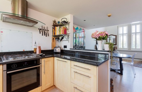 Southfields Apartment | Celestial Loft, by Veeve