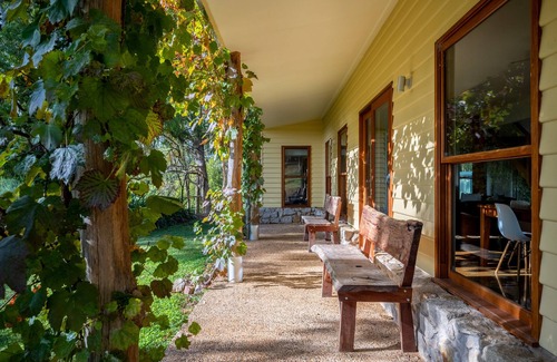 Wandiligong House | Centenary Heights - Boasting commanding views of the surrounding bushland and rolling hills of Wandiligong .