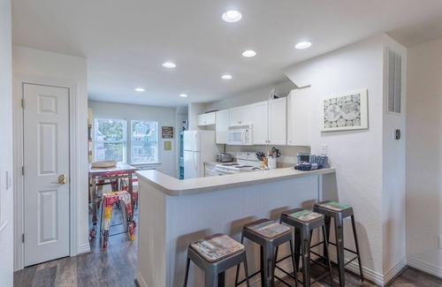 Bermuda Bay House | Centrally located townhome w/a resort-style community pool & gorgeous sunsets!