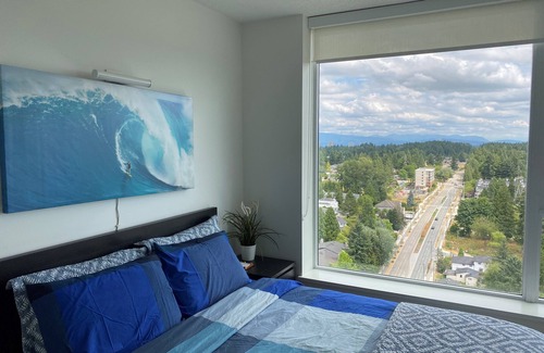 Surrey Condo | Centrally located, 30 plus floor Rocky Mountains view 1 BR Condo