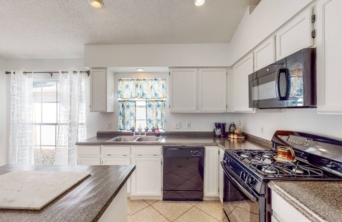 Casselberry House | Centrally located home with a firepit, large yard