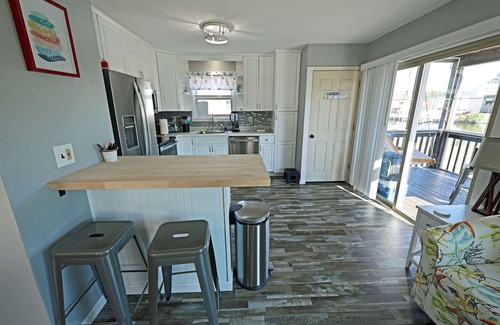 Colington Harbour House | CH219- 3 Bedroom Canal front Home with Private Dock and Kayaks!