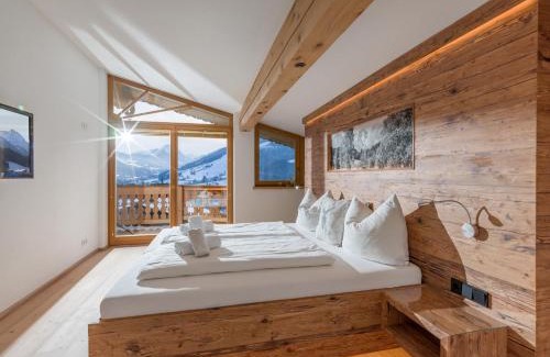 Kitzbuehel Ski Chalet | Chalet Weinberg Top 1 & Top 2 by Apartment Managers