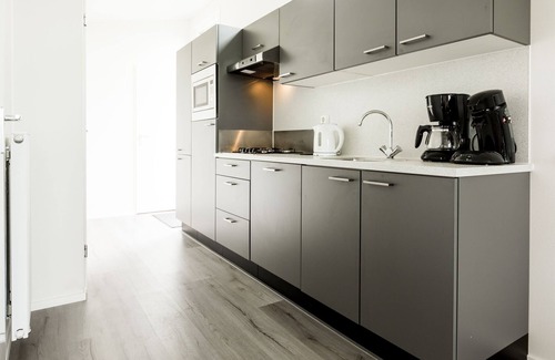 Berkhout Ski Chalet | Chalet with dishwasher near Hoorn