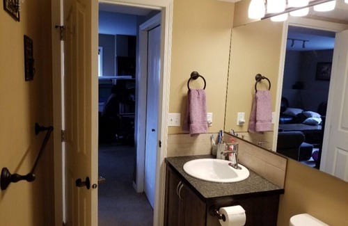 Red Deer House | Charming 1 bedroom rental in a family home in fabulous Red Deer-WiFi, AC & 65"TV