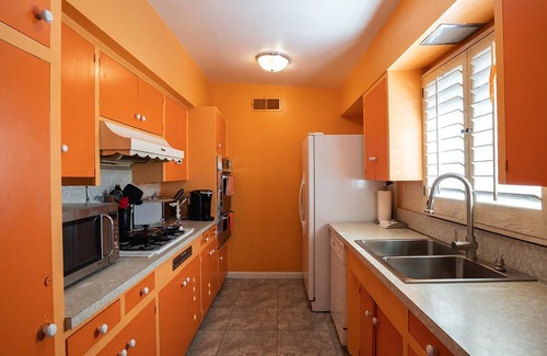 Warm Sands House | Charming 1-bedroom bungalow with private patio and pool view