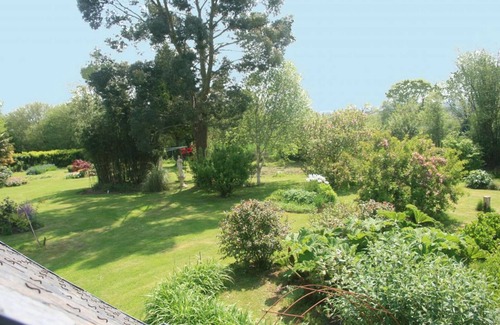 Montaigu-les-Bois Cottage | Charming 18th-Century Cottage with Garden, Near Beaches, Spa Access, and Modern Amenities