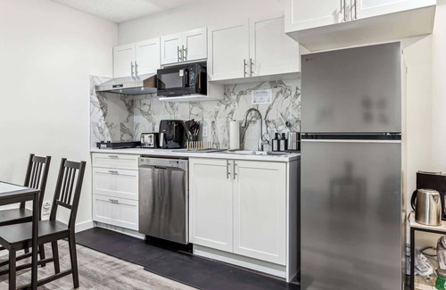 Cranston House | Charming 1BR Basement Suite w Parking—Calgary