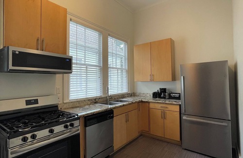 Milan Condo | Charming 3-bedroom condo 700 ft from St. Charles Streetcar in Uptown New Orleans