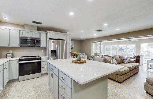 Lochmoor Waterway Estates House | Charming and sleek pool home, family friendly with canal access to river, WIFI