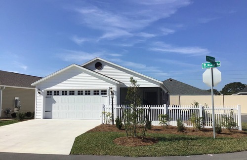 Wildwood Villa | Charming Corner Home w/Electric Golf Cart, BBQ Grill, & Stylish Comforts