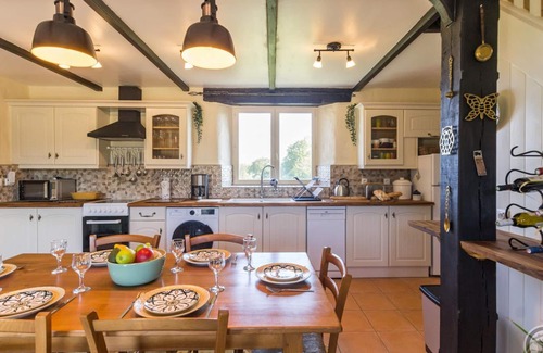 La Trinite Cottage | Charming Cottage with Garden, Terrace, and Bikes near Mont St-Michel