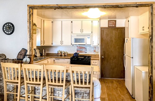 Alpine Village Cabin | Charming dog-friendly mountain getaway w/hot tub, fireplace, W/D, & great views