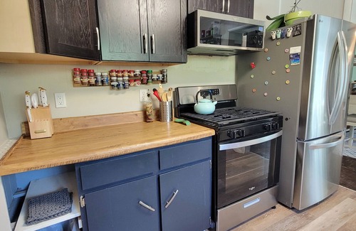 Harbor Springs Cottage | Charming garden cottage on the bike path with Scenic backyard in Harbor Springs