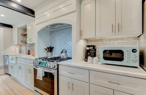 Excelsior House | Charming Historic Home with Luxury Suites & Courtyard