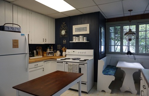 Burdett Cottage | Charming lakefront cottage with private beach and boat dock.