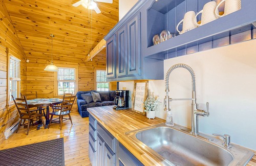 Lincolnville Cabin | Charming log cabin with firepit, lovely interior, and cozy patio/deck