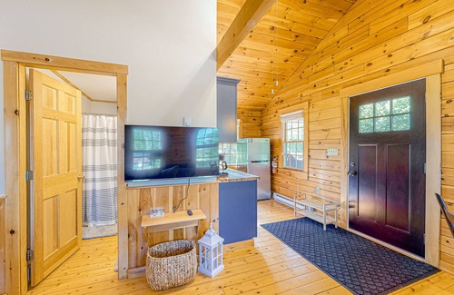 Lincolnville Cabin | Charming log cabin with firepit, lovely interior, and cozy patio/deck