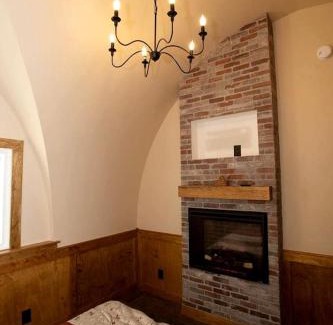 Springvale House | Charming Luxury Hobbit House with Private Hot Tub in Tranquil Woodlands on Littlefield Pond in Springvale, Maine