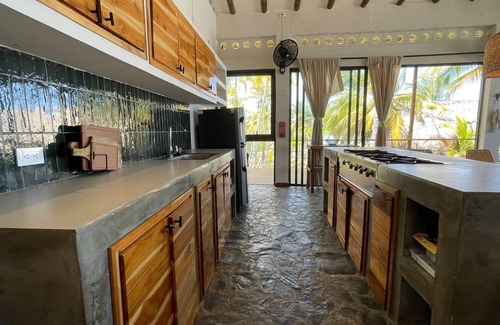 Palomino Villa | Charming oceanfront cabin with stunning views, private terrace, and beach access