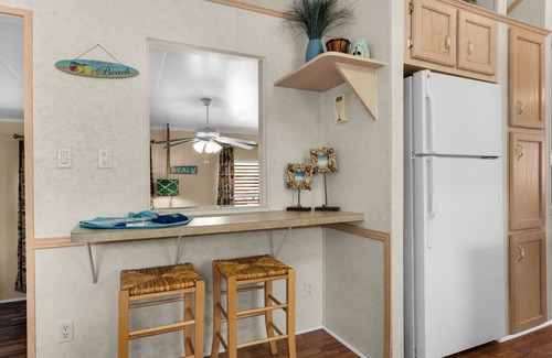 Upper Grand Lagoon Cottage | Charming pet-friendly cottage in a gated resort with amenities on the east end of Panama City Beach!
