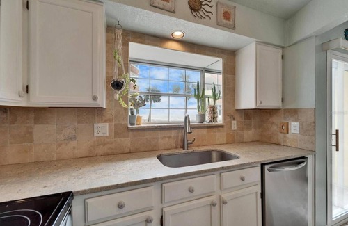 Redington Shores House | Charming Redington Shores 2-bedroom 2.5- bath beach front townhome with garage.