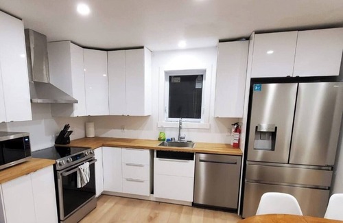 Lafleche Condo | Charming Retreat Near Montreal: Sleeps 7, Pet-Friendly, Free Parking!